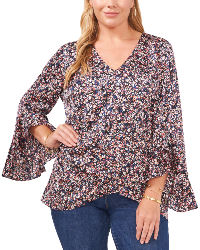 Front of a model wearing a size 1X Skylar Flutter Sleeve Tunic in CARMINE PINK by Vince Camuto. | dia_product_style_image_id:261486